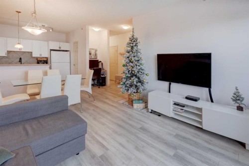 402-120 Country Village Circle Ne, Calgary, AB - Indoor Photo Showing Living Room