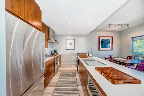 201-2124 17 Street, Calgary, AB - Indoor Photo Showing Kitchen With Stainless Steel Kitchen With Double Sink