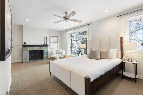 211 Coach Side Road Sw, Calgary, AB - Indoor Photo Showing Bedroom