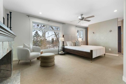 211 Coach Side Road Sw, Calgary, AB - Indoor Photo Showing Bedroom