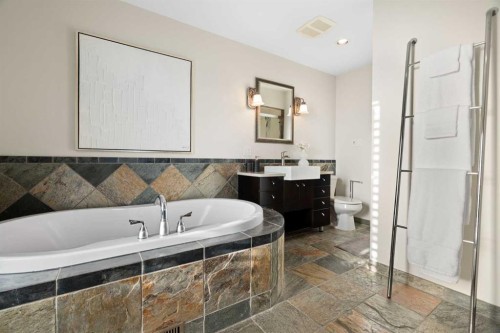 211 Coach Side Road Sw, Calgary, AB - Indoor Photo Showing Bathroom