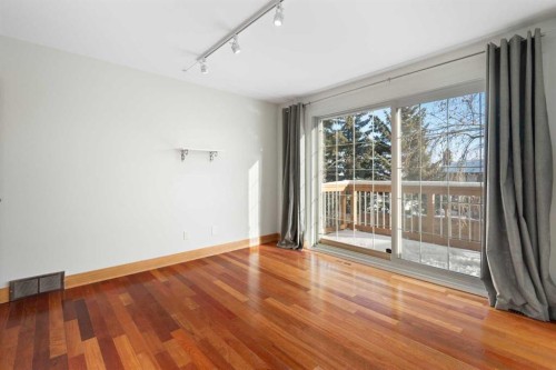 211 Coach Side Road Sw, Calgary, AB - Indoor Photo Showing Other Room