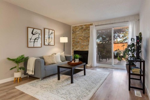 308-13104 Elbow Drive Sw, Calgary, AB - Indoor Photo Showing Living Room