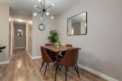 308-13104 Elbow Drive Sw, Calgary, AB - Indoor Photo Showing Dining Room