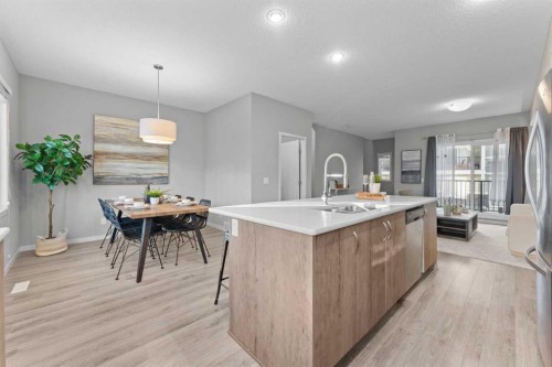 108 Nolanlake Villas Nw, Calgary, AB - Indoor Photo Showing Kitchen With Double Sink