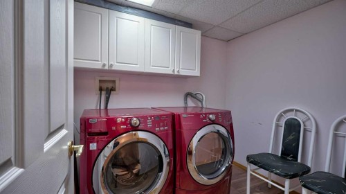 211-728 Country Hills Road Nw, Calgary, AB - Indoor Photo Showing Laundry Room