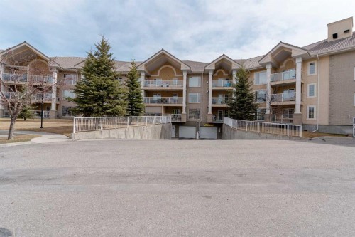 211-728 Country Hills Road Nw, Calgary, AB - Outdoor With Balcony With Facade