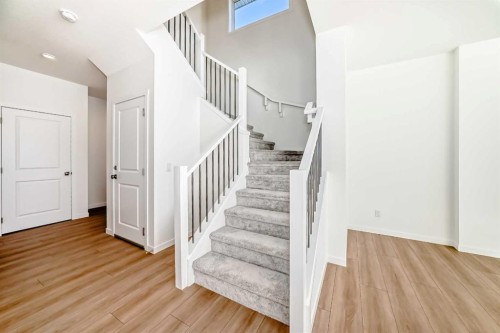 32 Southborough Common, Cochrane, AB - Indoor Photo Showing Other Room