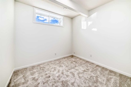 32 Southborough Common, Cochrane, AB - Indoor Photo Showing Other Room