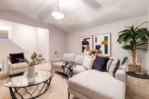 120 New Brighton Lane Se, Calgary, AB - Indoor Photo Showing Living Room