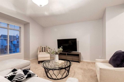 120 New Brighton Lane Se, Calgary, AB - Indoor Photo Showing Living Room