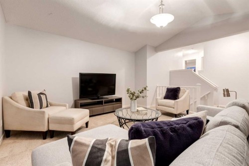 120 New Brighton Lane Se, Calgary, AB - Indoor Photo Showing Living Room