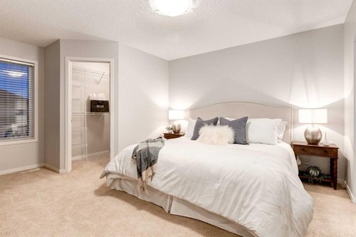 120 New Brighton Lane Se, Calgary, AB - Indoor Photo Showing Bedroom