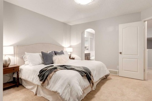 120 New Brighton Lane Se, Calgary, AB - Indoor Photo Showing Bedroom