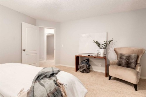 120 New Brighton Lane Se, Calgary, AB - Indoor Photo Showing Bedroom