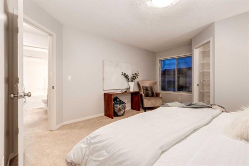 120 New Brighton Lane Se, Calgary, AB - Indoor Photo Showing Bedroom