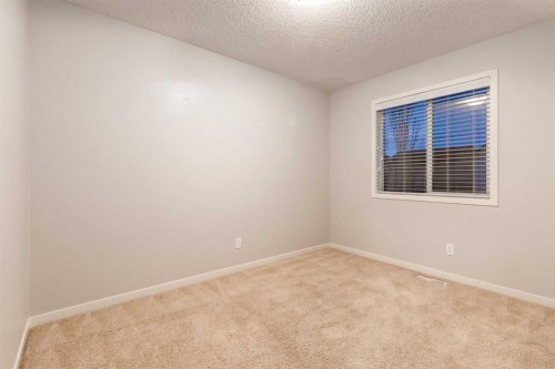120 New Brighton Lane Se, Calgary, AB - Indoor Photo Showing Other Room