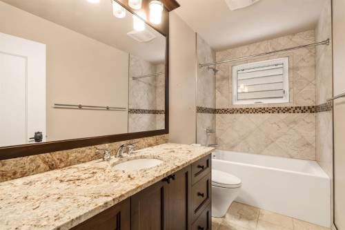 716 Coach Bluff Crescent Sw, Calgary, AB - Indoor Photo Showing Bathroom