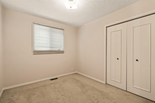 716 Coach Bluff Crescent Sw, Calgary, AB - Indoor Photo Showing Other Room
