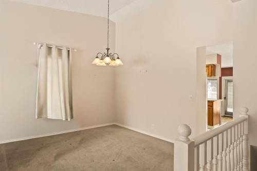 716 Coach Bluff Crescent Sw, Calgary, AB - Indoor Photo Showing Other Room