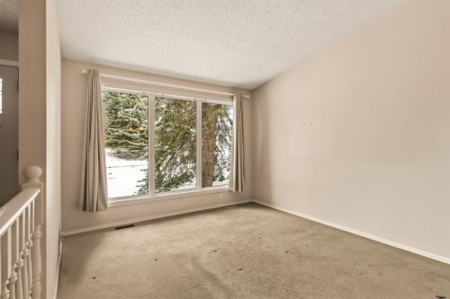 716 Coach Bluff Crescent Sw, Calgary, AB - Indoor Photo Showing Other Room