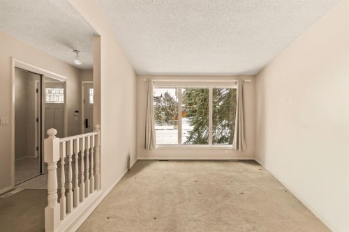 716 Coach Bluff Crescent Sw, Calgary, AB - Indoor Photo Showing Other Room