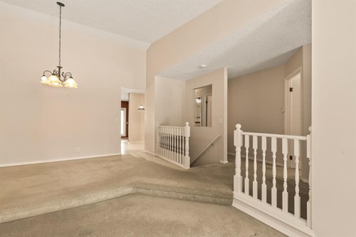 716 Coach Bluff Crescent Sw, Calgary, AB - Indoor Photo Showing Other Room