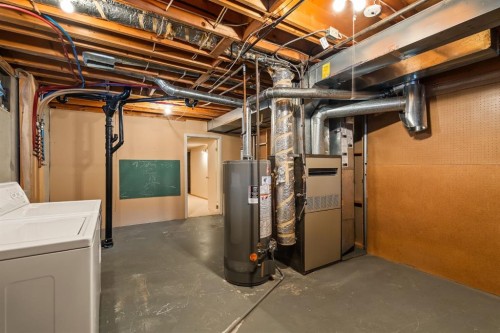 716 Coach Bluff Crescent Sw, Calgary, AB - Indoor Photo Showing Basement