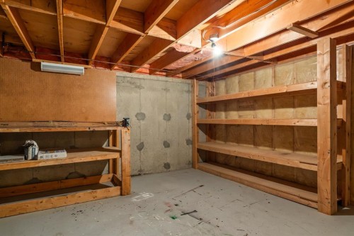 716 Coach Bluff Crescent Sw, Calgary, AB - Indoor Photo Showing Basement
