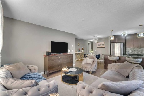 4209-155 Skyview Ranch Way Ne, Calgary, AB - Indoor Photo Showing Living Room