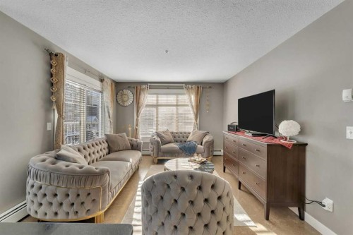 4209-155 Skyview Ranch Way Ne, Calgary, AB - Indoor Photo Showing Living Room