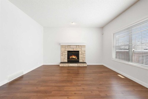 283 Prestwick Landing Se, Calgary, AB - Indoor With Fireplace