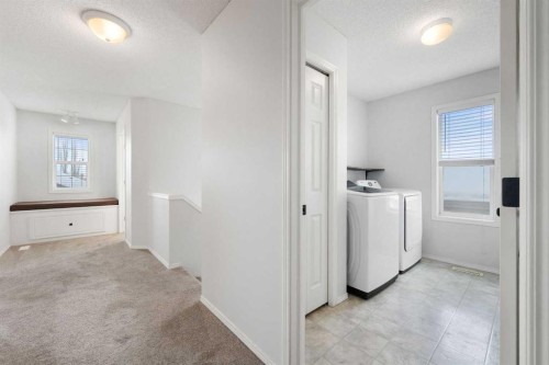 283 Prestwick Landing Se, Calgary, AB - Indoor Photo Showing Laundry Room