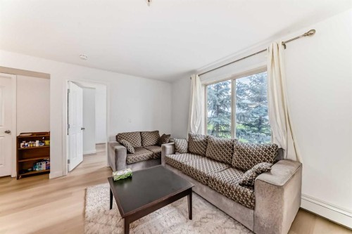 211-355 Taralake Way Ne, Calgary, AB - Indoor Photo Showing Living Room