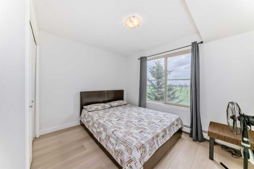 211-355 Taralake Way Ne, Calgary, AB - Indoor Photo Showing Bedroom