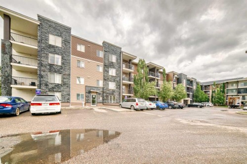 211-355 Taralake Way Ne, Calgary, AB - Outdoor With Balcony With Facade