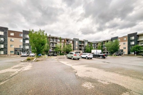 211-355 Taralake Way Ne, Calgary, AB - Outdoor With Balcony With Facade