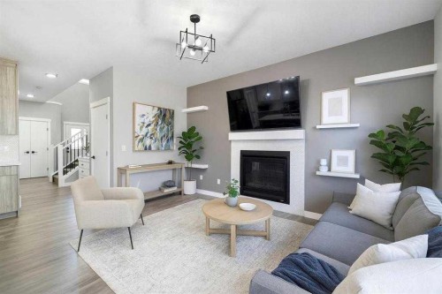 628 Edgefield Street, Strathmore, AB - Indoor Photo Showing Living Room With Fireplace