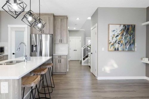 628 Edgefield Street, Strathmore, AB - Indoor Photo Showing Kitchen With Stainless Steel Kitchen With Double Sink With Upgraded Kitchen