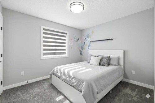 628 Edgefield Street, Strathmore, AB - Indoor Photo Showing Bedroom