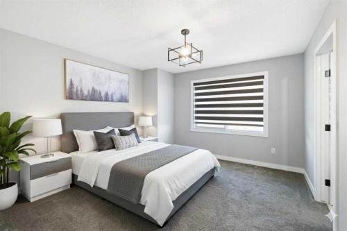 628 Edgefield Street, Strathmore, AB - Indoor Photo Showing Bedroom