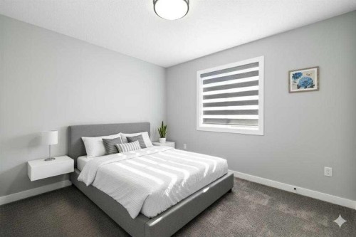 628 Edgefield Street, Strathmore, AB - Indoor Photo Showing Bedroom
