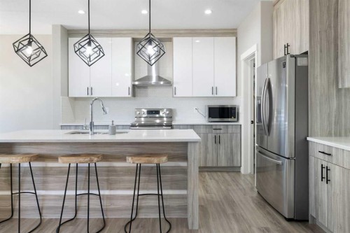 628 Edgefield Street, Strathmore, AB - Indoor Photo Showing Kitchen With Stainless Steel Kitchen With Upgraded Kitchen