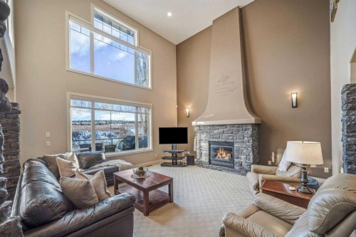 74 Sherwood Point Nw, Calgary, AB - Indoor Photo Showing Living Room With Fireplace