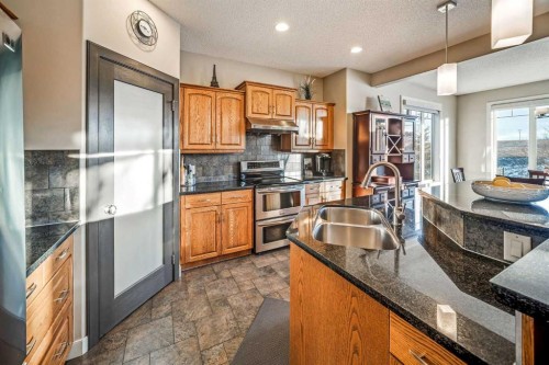 74 Sherwood Point Nw, Calgary, AB - Indoor Photo Showing Kitchen With Double Sink