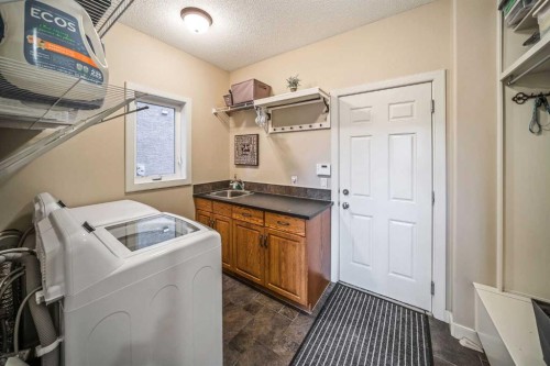 74 Sherwood Point Nw, Calgary, AB - Indoor Photo Showing Laundry Room