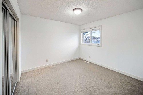 74 Sherwood Point Nw, Calgary, AB - Indoor Photo Showing Other Room