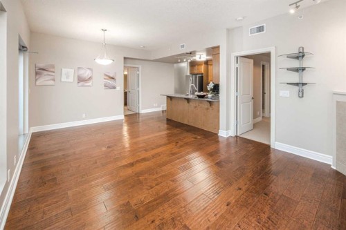 1907-920 5 Avenue Sw, Calgary, AB - Indoor With Fireplace