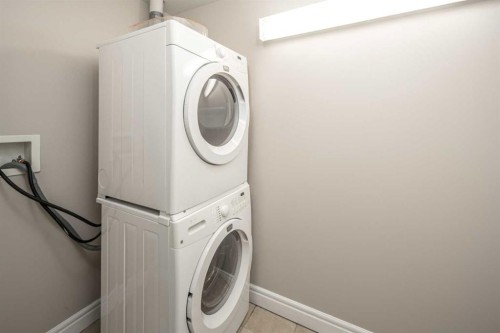 1907-920 5 Avenue Sw, Calgary, AB - Indoor Photo Showing Laundry Room