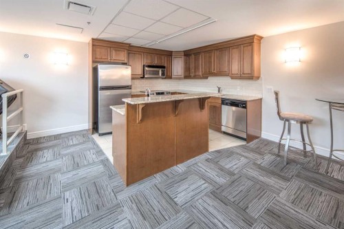 1907-920 5 Avenue Sw, Calgary, AB - Indoor Photo Showing Kitchen With Stainless Steel Kitchen